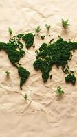 A Creative Depiction of the World Map Made from Green Moss on Textured Background photo