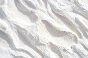 Textured White Sand with Wave Patterns photo