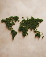 A Creative Representation of the World Map Made with Lush Green Grass Texture photo