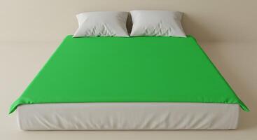 A bed with a green cover on it photo