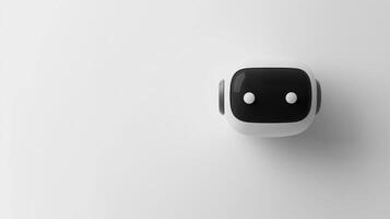 A white and black robot on a white surface photo