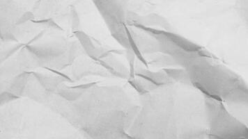 Crumpled white paper texture background, showcasing abstract patterns and textures for graphic design and creative projects. video