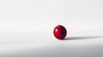 A red apple on a white surface photo