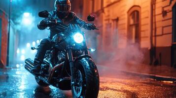 A person riding a motorcycle on a rainy night photo