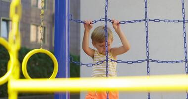 Child Climbing Playground Net in Summer video