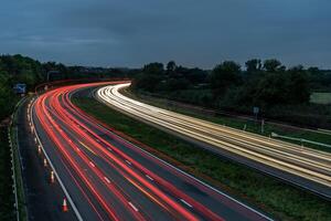 M4 Traffic lights flowing on m4 motorway at twilight photo