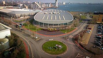 Aerial View of Modern Circular Building Near Waterfront photo