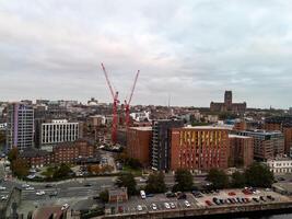 Liverpool cityscape showing construction cranes and anglican cathedral photo