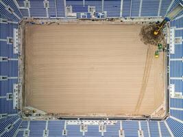 Construction workers preparing the ground for a game at anfield stadium liverpool photo