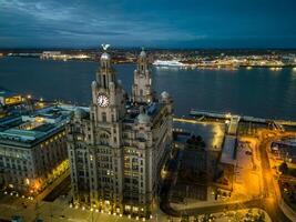 Liverpool Liver building illuminating liverpool skyline at twilight photo