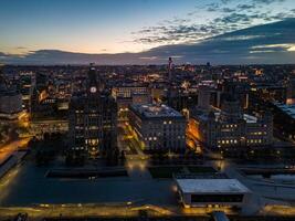 Liverpool Liverpool skyline showing the liver building at dusk with dramatic clouds photo