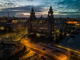 Liverpool Liverpool skyline showing the royal liver building at dusk photo