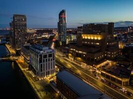 Liverpool Liverpool city centre skyline illuminating during twilight hour photo