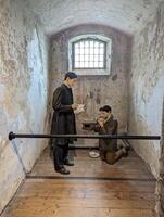 A prayer time in a prisoner's cell, Cork City Gaol, Cork, County Cork, Ireland on 16-09-2023 photo