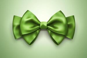 A green bow is on a green background photo