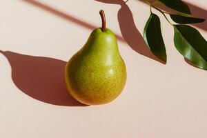 Fresh green pear with shadow and leaf on soft surface photo