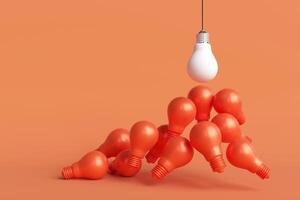 Inverted white light bulb with many orange light bulbs pointing in the same direction. Concept of different ideas, innovation, and new options. photo