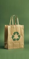 Eco friendly paper bag with recycling symbol against a green background, promoting sustainability and environmental consciousness photo