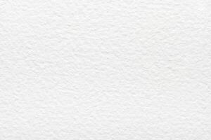 Textured white paper surface with fine grain pattern and subtle fibers. photo