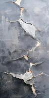Abstract cracked texture with weathered grey surface and exposed layers photo