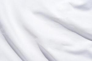 Smooth white fabric texture with soft light and subtle shadows for background or design. photo