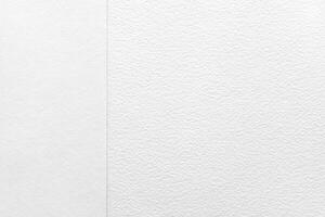 Textured white paper background with subtle patterns for creative design projects. photo