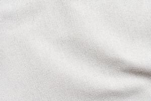 Close-up of white cotton fabric texture with detailed weave and soft surface for textile design inspiration. photo