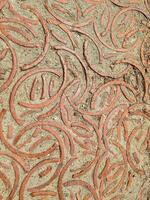 Decorative brick pattern creating concentric circles on a pathway photo