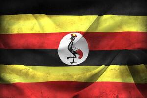 Vintage look 3D-Illustration of a Uganda flag - realistic waving fabric flag photo