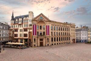 Riga, Latvia, 2024 - Historic Square in Riga with Latvijas Radio Building and Flags photo