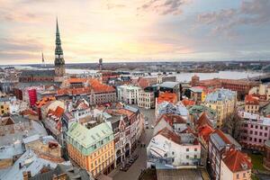 Riga, Latvia, 2024 - Aerial View of Rigas Historic Architecture and St. Peters Church photo