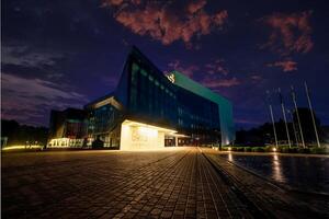 Riga, Latvia, 2024 - GORS Cultural Centre in Rezekne, Latvia at Twilight with Glass Facade photo