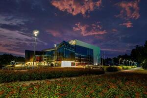 Riga, Latvia, 2024 - GORS Cultural Centre with Illuminated Glass Facade in Rezekne, Latvia photo