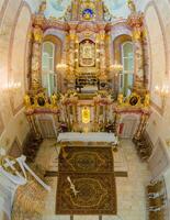 Riga, Latvia, 2024 - Ornate Baroque Interior of a European Cathedral with Altar View photo