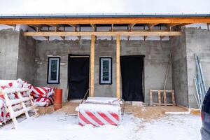 Winter Construction Site with Partially Built Concrete Structure photo