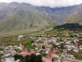 Small Town at the Base of Rugged Mountains in Georgia photo