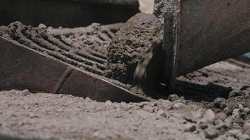 Hardened cement chunk forming in concrete mixer defect video