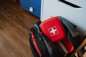 This Compact First Aid Kit is conveniently packed and stored in a backpack, making it ready for use in emergency situations whenever they arise or may be needed photo