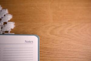 Lined page notes on the desk photo