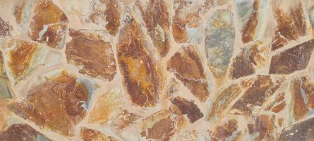 Rustic stone wall with abstract form of the rocks photo
