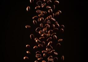 Aromatic coffee beans are falling in a cascade against a dark, elegant backdrop. photo