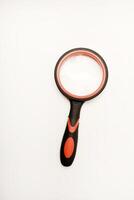 Magnifying glass on a white background. photo