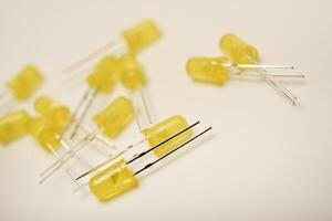 Multihued yellow LED bulbs. LED circuitry element. photo