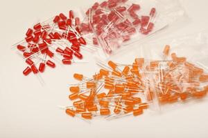 Red and orange multicolor LED indicators. LED circuit component. photo
