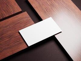 Contemporary business card mockup on dark wood, presenting a simple and sleek layout for sophisticated businesses. photo