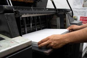 Man Using Industrial Printer High Quality Printing Operation. High quality photo