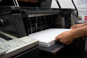 Technician Operating Industrial Printer Advanced Printing Process. High quality photo