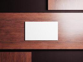 Professional business card mockup on a smooth wooden background, showcasing modern and clean design ideal for creatives or agencies. photo