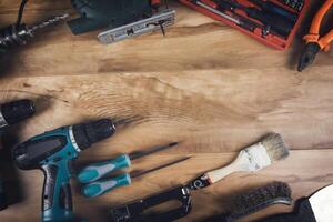 Tools on a wooden table with copy space photo