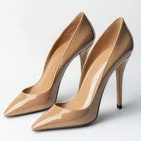 Elegant Beige Heels on White Background with Clean Minimalist Look photo
